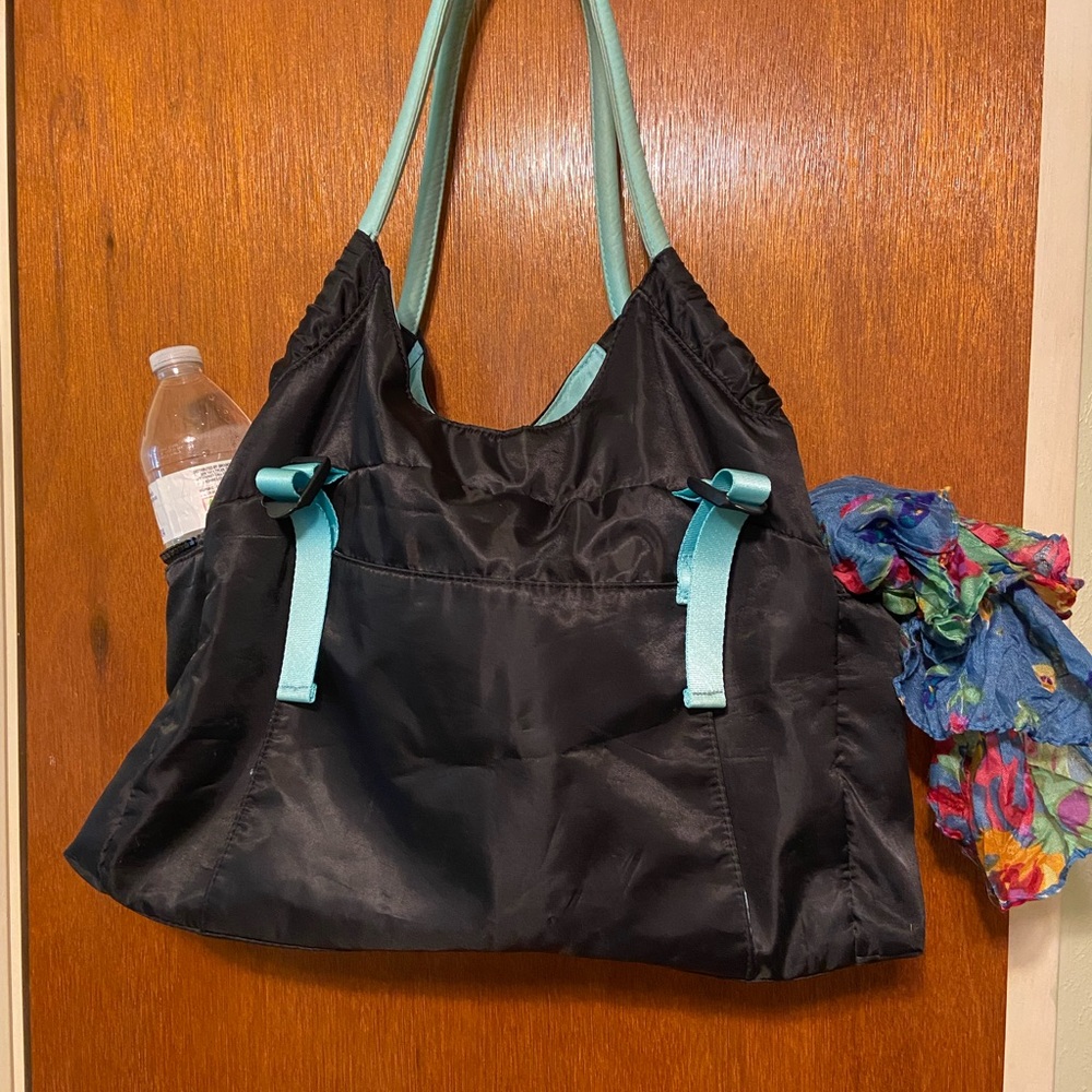 It’s actually a diaper bag. It worked great for a work bag.